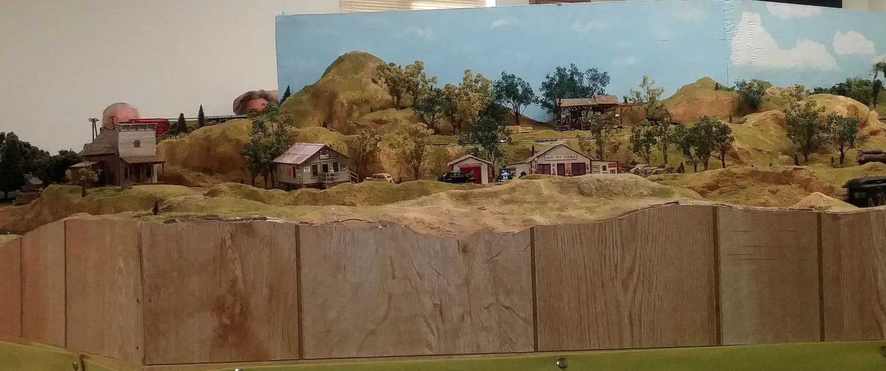 Model railroad layout in Old Town scene